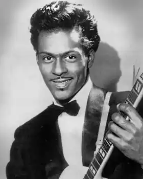 Chuck Berry holding guitar