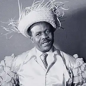 Calypso music singer Lord Invader wearing straw hat