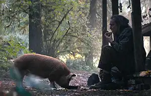 Rob and his truffle-hunting pig from the movie Pig