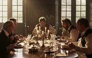 Dining scene with family from the movie The Taste of Things