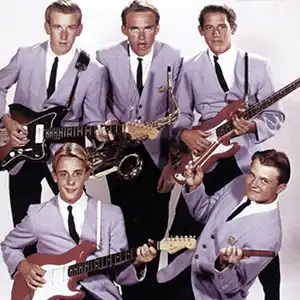 The Surfaris posing in suits