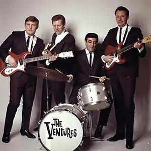 The Ventures posing in suits